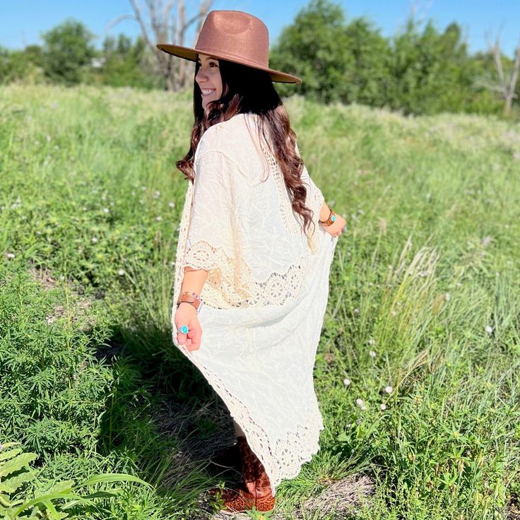 This Cream Bohemian Goddess Kimono is the perfect piece for a glamorous bohemian look. Crafted with intricate crochet open patch details, it creates an effortless look that is sure to turn heads. A longline silhouette perfect for layering over your favorite outfit, this kimono is a must-have for luxury bohemian style. One size Bohemian Lace Beach Cover-up, Bohemian Lace Patchwork Summer Cover-up, Spring Festival Lace Cover-up, Oversized Bohemian Fall Cover-up, Bohemian Lace Cover-up For Summer, Bohemian Summer Lace Patchwork Cover-up, Bohemian Lace Crochet Top, Bohemian Crochet Top For Fall Day Out, Lace Crochet Top As Beach Cover-up For Spring