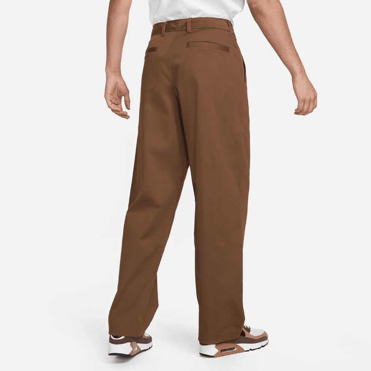 Style No. DX6027-259 Color: Cacao Wow/White 98% Cotton/2% Elastane. These durable chinos are made for life and built to last. The classic cut is inspired by timeless workwear designs, giving you some extra room through the seat and legs for easy movement and casual comfort. Soft cotton twill fabric is made with a bit of spandex for added comfort and stretch. Double-cuffed hem with double-needle stitch. Loose fit for a roomy feel. Nike Life Men's Unlined Cotton Chino Pants. Red Puffer, Cotton Chinos, Red Nike, Chino Pants, Twill Fabric, Cotton Twill Fabric, Nike Pants, Chinos Pants, For Life