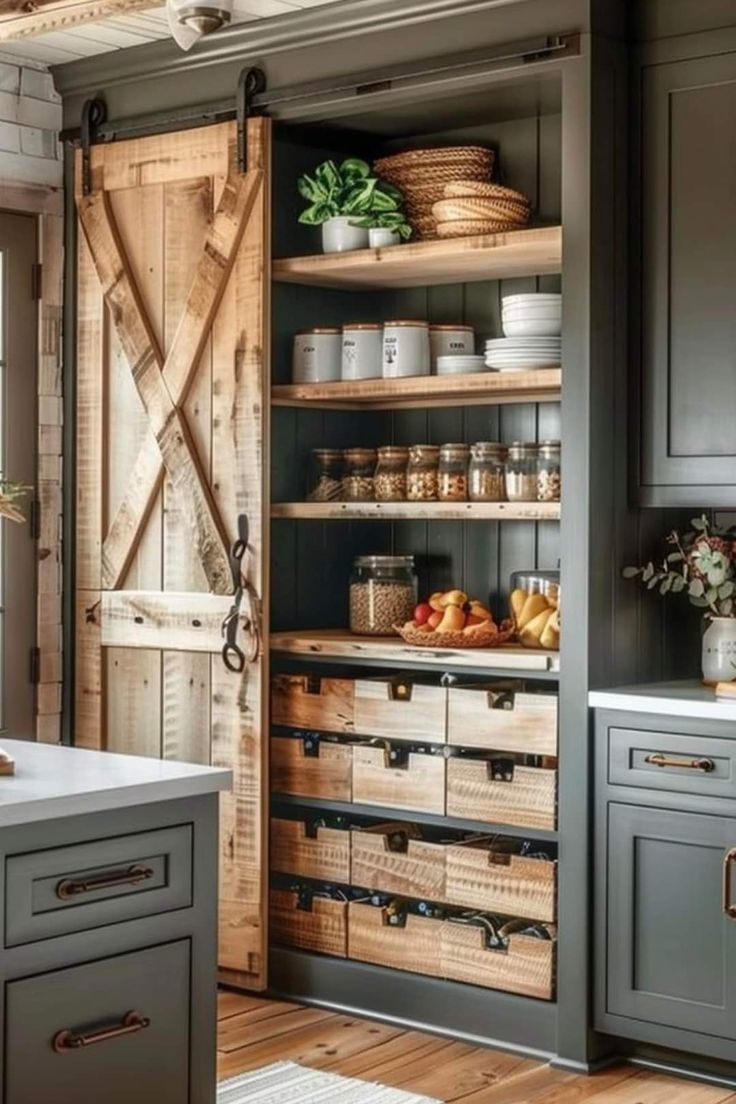 an open pantry with lots of drawers and baskets on the shelves in front of it