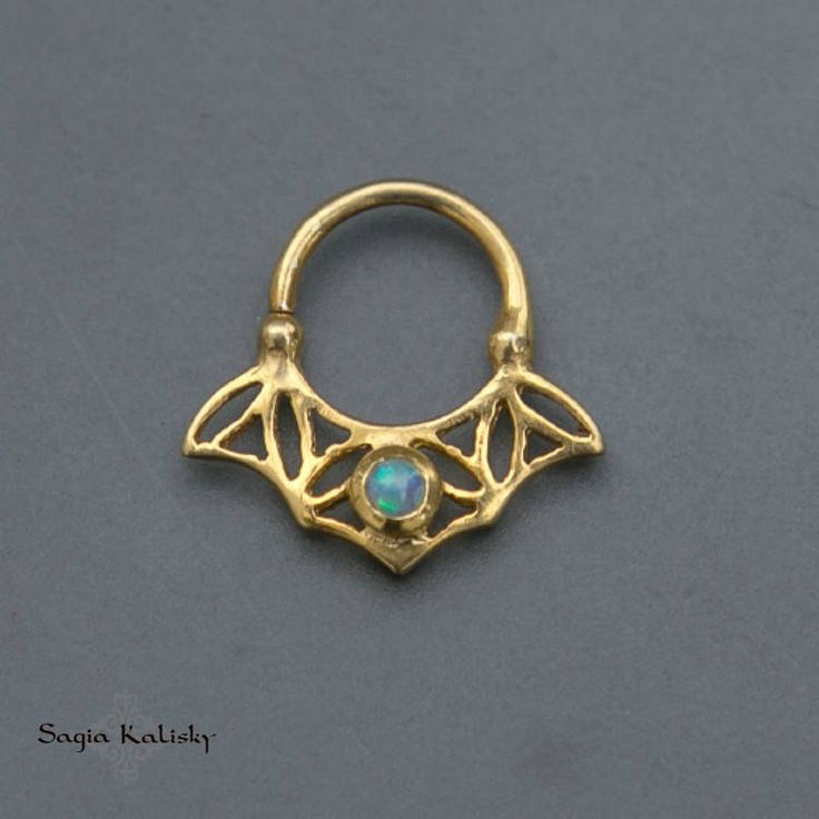 "24k Gold plated or Sterling Silver Septum Ring with Opal gemstone, Daith Earring, also fits Helix, Daith, Tragus, Cartilage Earring Jewelry, Tribal Unique Earring, available in 18g oooo Piercing rings are super on-trend jewelry. Find a ring that works best for your personality. You could go subtle and rock a simple one, or you can go bold and wear one that's colorful! This septum ring, taken from my FLOWER OF LIFE Collection, is made of 24k Gold Plated over Sterling Silver (2 microns) and set w Handmade Silver Brass Body Jewelry, Handmade Brass Body Jewelry As A Gift, Unique Gold Metal Cartilage Earrings, Gold Hoop Spiritual Jewelry, Unique Gold Metal Body Jewelry, Unique Metal Body Jewelry For Gift, Ceremonial Pierced Brass Jewelry, Elegant Pierced Septum Ring For Gift, Elegant Pierced Septum Ring As Gift