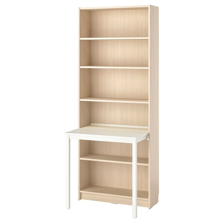 an empty bookcase with a white table in front of it on a white background