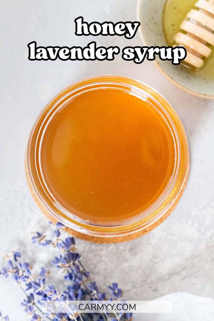 honey lavender syrup in a glass bowl next to a spoon