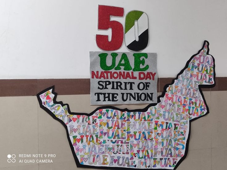 there is a sign that says 50 jae national day spirit of the union on it