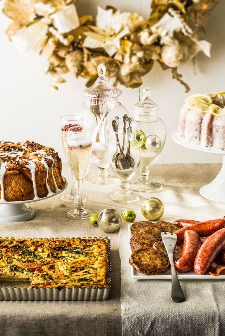 a table topped with cakes and other desserts