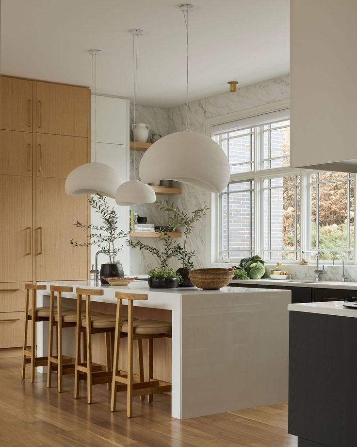 the kitchen is clean and ready to be used as a dining room or living area