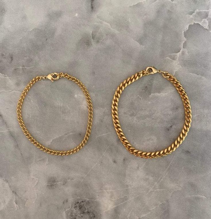 This gorgeous Cuban Chain bracelet is made from 18k gold vermeil. The bracelet is the perfect piece of fashion jewelry to add a touch of elegance to any outfit. Whether worn as part of your everyday wear or to a more formal occasion you’ll be sure to shine!Details: Bracelet comes in 3mm or 5mm in width Option to select 6 - 9 inches in length Each bracelet comes with an additional 1 inch adjustable extender chain for that perfect fit SHIPPING & PACKAGINGAll items come packaged in a small jewe Bracelet Thick, Cuban Chain Bracelet, Gold Chain Bracelet, Chain Bracelets, Small Jewelry Box, Gold Bracelet Chain, Statement Bracelet, Cuban Chain, Small Jewelry