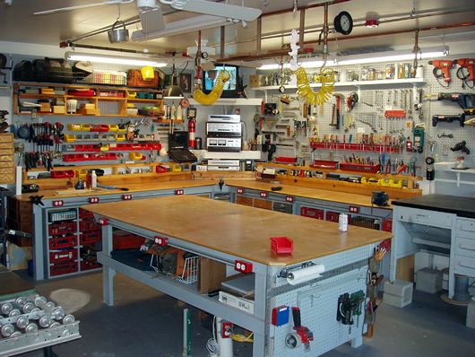 a large workbench with lots of tools on it