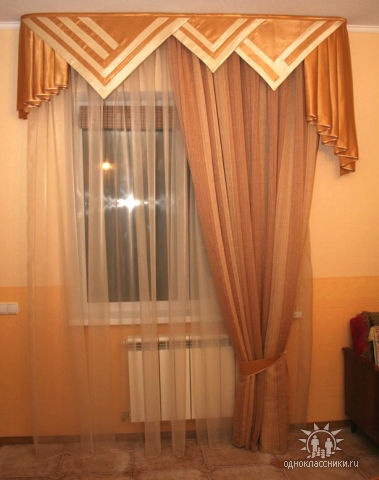 the curtains are hanging in front of the window