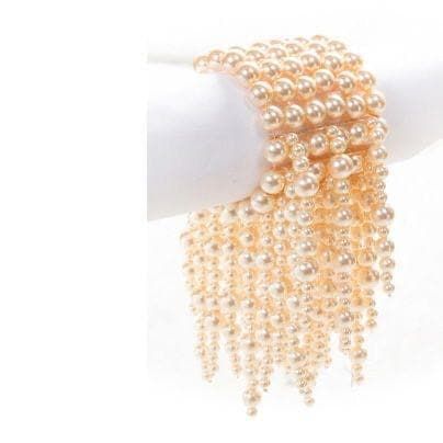 If you wish to achieve a stunning party look with something a little different, our Okore Multistrand Cluster Bracelet will not disappoint! Incorporating stunning Brown Wood beads of light and dark shades, and Pearl this cluster vine bracelet oozes style and panache. Is elastic threads is versatile to fit different hand sizes. It has been skillfully put together, with careful detail to attention, by our dedicated and capable artisans. Pair this stunning article with our breathtaking Bronze/Golde Pearl White Bracelets With Pearl Drop For Party, Pearl White Beaded Bracelets For Party, Pearl White Bracelet With Pearl Drop For Party, Elegant Beaded Bracelets With Pearl Charm For Party, Pearl Bangle Bracelet For Party, Pearl Bangle For Party, Elegant Pearl Drop Bracelet For Party, Pearl Bangle Jewelry For Party, Party Pearl White Beaded Bracelets With Pearl Chain