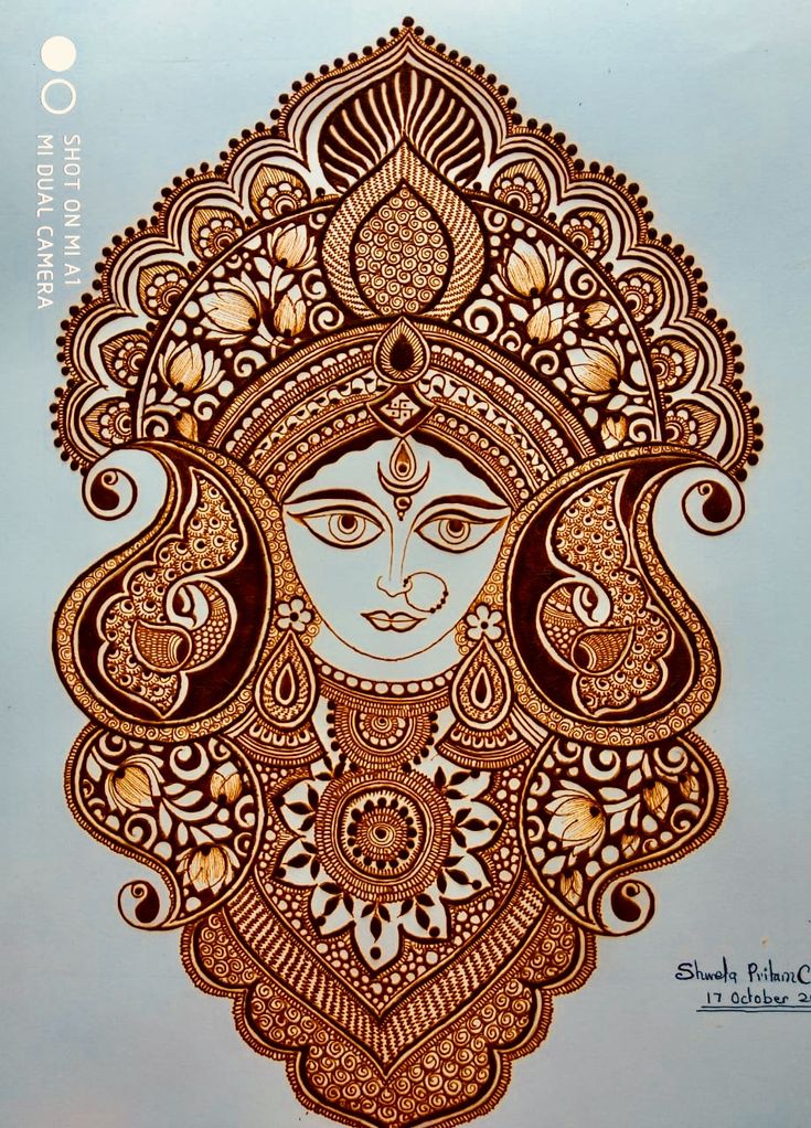 an intricately designed drawing of a woman's face