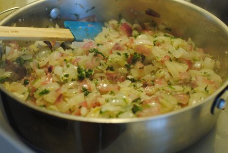 the food is being cooked in the pot on the stove