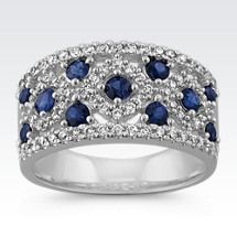 a white gold ring with blue sapphires and diamonds