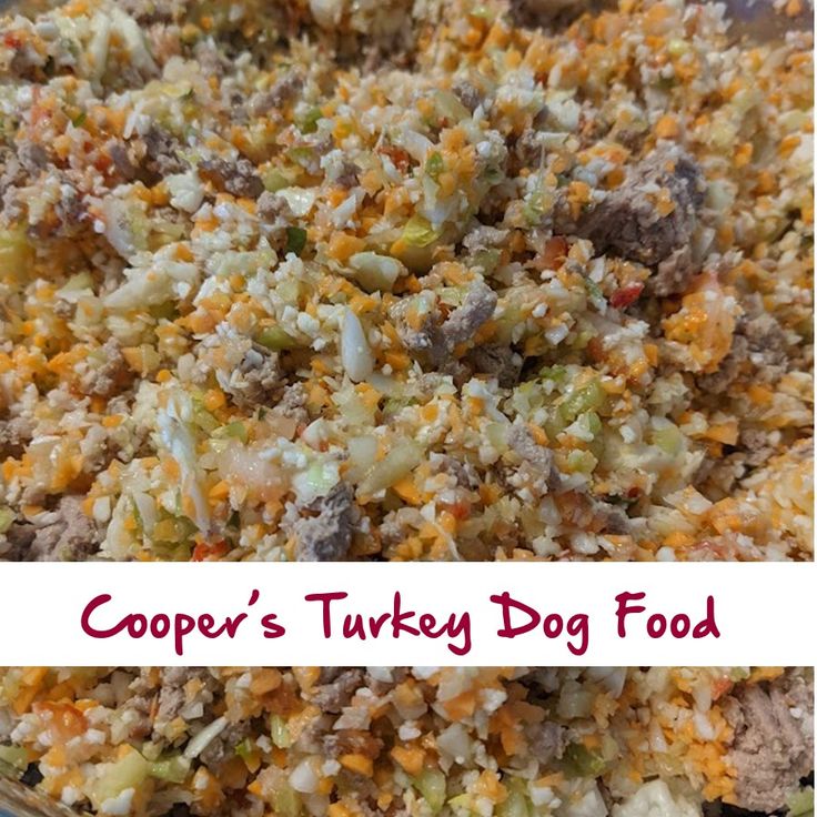 a close up of food in a pan with the words cooper's turkey dog food