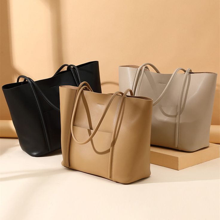 "* Stylish and Simple Genuine Leather Bag. * Genuine Leather Fashion Handbag, Minimalist Top Handle Bag, Women Leather Bag,Top Handle Purse, Luxury Leather Handbag, Everyday Bag, Personalized Gift, Birthday Gift,Mother's Day Gifts,Gift For Her. Basic information: 1. Dimensions: * Length  13.78 inches (35 cm) * Width    6.3  inches (16 cm) * Height   11.61 inches (29.5 cm) * Internal bag is removable 2. Material:  Genuine Leather     3. Color:  Apricot / Light Brown / Black  4. Function:  Shoulder  / Portable / Hand Held   Features: * Capacity Design:  It can accommodate 13\" Laptop, IPAD, files, books, magazines, mobile phones,wallet,cosmetics,lipstick,etc. * Comfortable & Durable Material: Using high quality cowhide, delicate and soft, not easy to deformation. Easy to clean and handle, br Leather Laptop Tote Bag, Leather Laptop Tote, Sac Tote Bag, Soft Leather Purse, My Style Bags, Cowhide Bag, Bags Leather Handbags, Girly Bags, Genuine Leather Totes