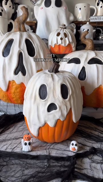 halloween pumpkins decorated with black and white decorations