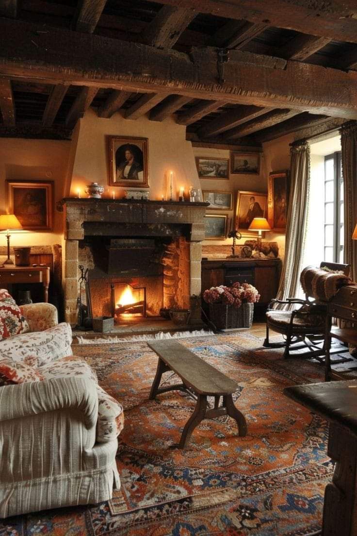 a living room filled with furniture and a fire place in the middle of it's walls