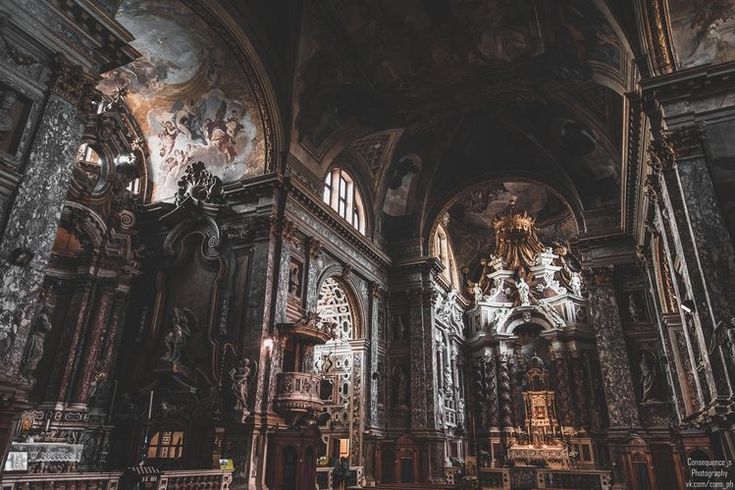 the interior of an old church with high ceilings