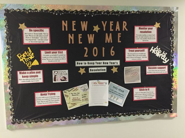 a new year's bulletin board with notes and pictures