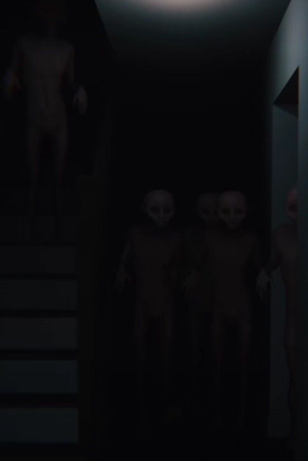 three creepy people standing in the dark next to stairs