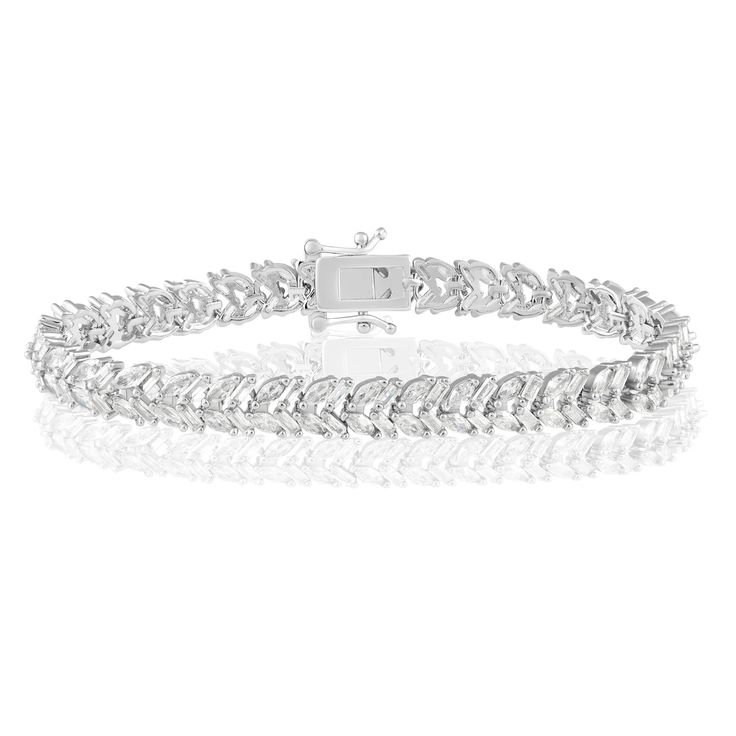 The Eloise Tennis Bracelet sparkles with the brilliance of CZ, offering an elegant touch of luxury to any ensemble. With its delicate design, this exquisite bracelet adds a special touch of sophistication and glamour. Perfect for special occasions and everyday wear alike. 7" Stainless Steel Cz Studs Hypoallergenic & Tarnish Resistant Classic Sparkling Cubic Zirconia Bracelets, Sparkling White Gold Bracelets With Cubic Zirconia, Elegant Sparkling Diamond Bracelet, Elegant Sparkling Bangle Bracelet, Classic Silver Sparkling Diamond Bracelet, Glamorous Diamond Bracelet With Accents For Formal Events, Glamorous Diamond Bracelet For Gift, Glamorous Formal Diamond Bracelet With Accents, Classic Sparkling Diamond White Bracelets