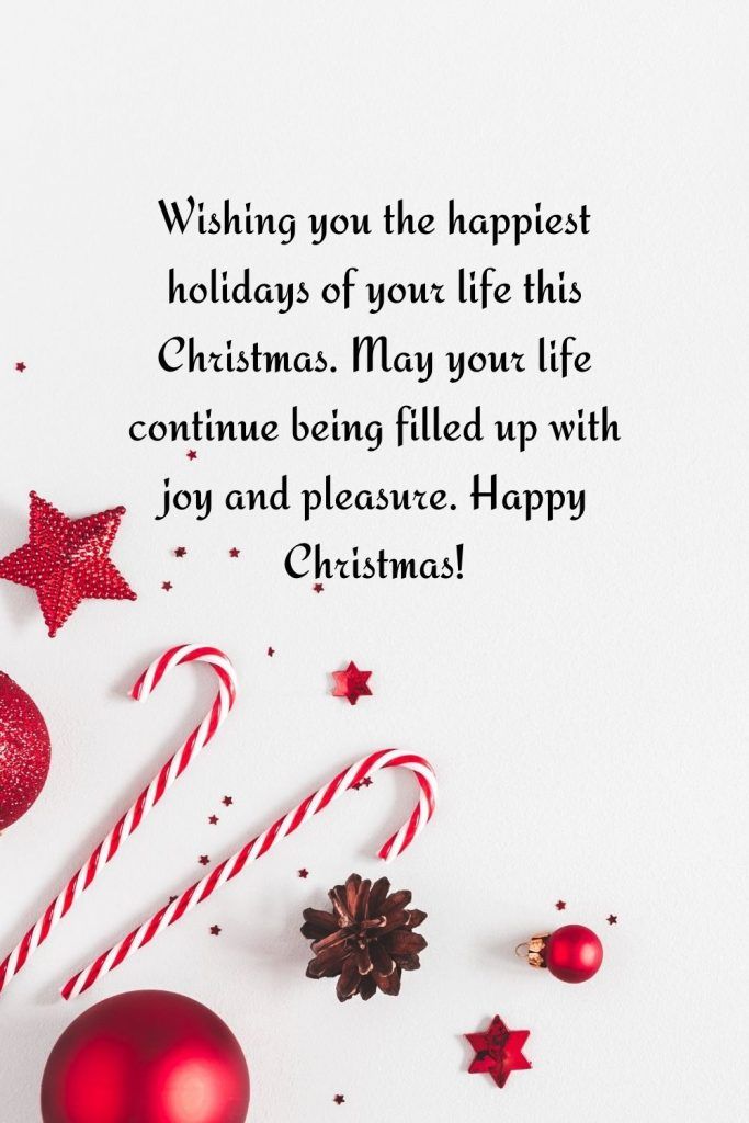 christmas greeting card with red ornaments and candy canes on white background, holiday message