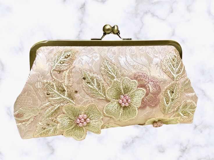 Check out this GORGEOUS clutch from our seller JPE Finery!__ While this purse would be perfect for any special occasion, we think it would especially suit a bride with a blush wedding gown or her maid of honor!__ This handmade clutch was crafted in the state of Washington. __ #handmadeclutch #pinkclutch #floralclutch #handmadefloralclutch #MyCommunityMade #handmadegifts #shopsmallbusiness #etsyalternative #maidofhonorgifts #maidofhonorgift #maidofhonorpurse #weddingpurse #weddingclutch Elegant Envelope Evening Bag With Removable Pouch, Feminine Rectangular Clutch For Party, Designer Pouch Evening Bag For Gift, Designer Pouch Evening Bag As Gift, Designer Pouch Evening Bag, Handmade Chic Clutch Evening Bag, Feminine Evening Pouch Clutch, Chic Handmade Clutch Evening Bag, Beige Envelope Clutch For Evening