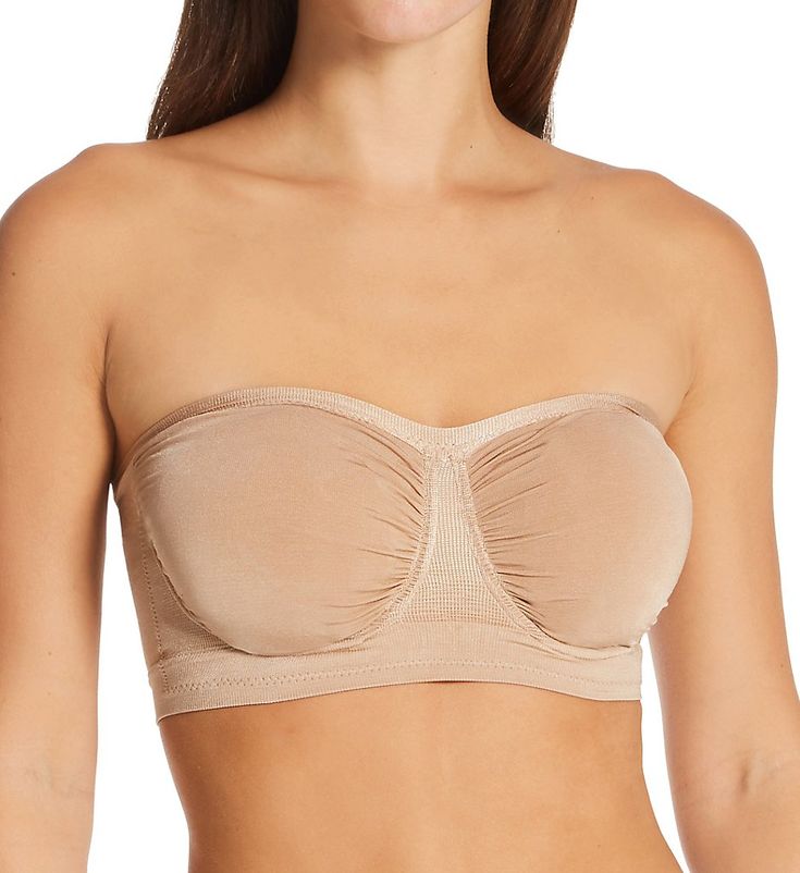 Soft strapless bra is knit for a comfortable stretch fit and easily changes shape to give you a perfect fit. Made of nylon and spandex. Seamless underwire cups are self lined with built-in pockets for removable padding, included. Cups are dual layers of 4-way stretch knit with ruching at the center and sides so that fit expands. Sweetheart neckline has a ribbed edge for flexible fit. Silicone grippers along the inner edge of the neckline (near center), keep cups from slipping. Ribbed 2-layer bas Fitted Bandeau Bra With Built-in Bra, Micro-elastic Bandeau Bra With Built-in Support, Stretch Tube Top With Built-in Bra And Underwire, Fitted Underwire Beige Bra, Beige Seamless Underwire Bra, Bandeau Bra, Strapless Bra, Underwire Bra, Sweetheart Neckline