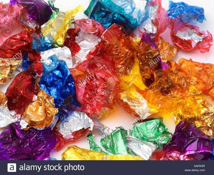 colorful candy wrappers on white background stock photo royalty free image gummy bags, candies, food packaging design, color photography, rainbows, person, all over the world, colored walls