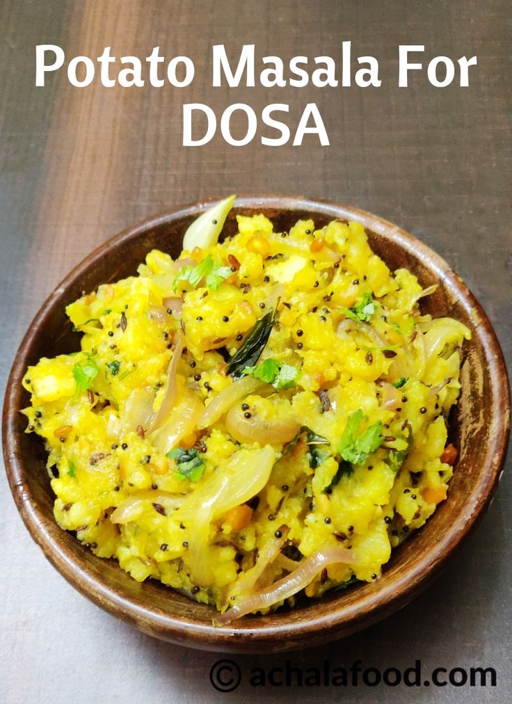 potato masala for dosa in a wooden bowl on a table with text overlay