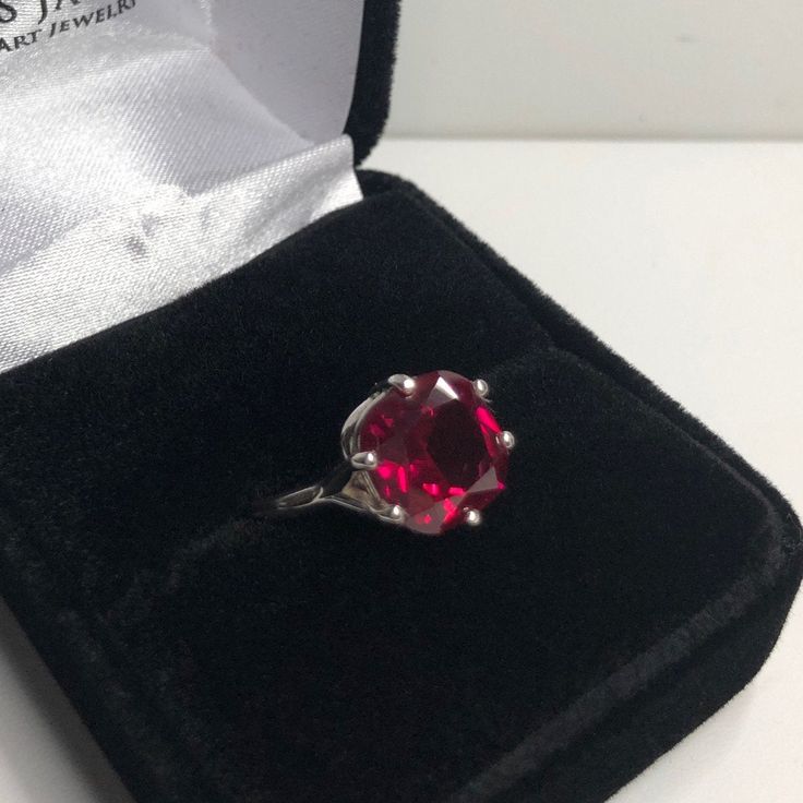 Beautiful Cushion Cut Ruby Ring * 5ct Cushion Cut Ruby * Solid Sterling Silver * Sized to Order - Select your Size Gift Services are Free! Just message me at checkout! Matching Pendant & Earrings Available! Also available in 10k or 14k White, Yellow or Rose Gold here https://www.etsy.com/listing/682767578/beautiful-5ct-cushion-cut-ruby-10k-14k This 5ct Ruby is Laboratory Grown. It is identical to natural in every way, including Chemistry, Composition & Hardness with flawless clarity &amp Classic Ruby Ring Gift With Round Stone, Classic Ruby Ring With Round Stone As Gift, Classic Gift Ruby Ring With Round Stone, Classic Ruby Ring With Round Stone, Classic Ruby Crystal Ring As Gift, Anniversary Ruby Ring With Vs Clarity And Round Cut, Ruby Rings With Diamond Cut, Round Emerald Ring With Vvs Clarity As Gift, Anniversary Ruby Ring With Vs Clarity