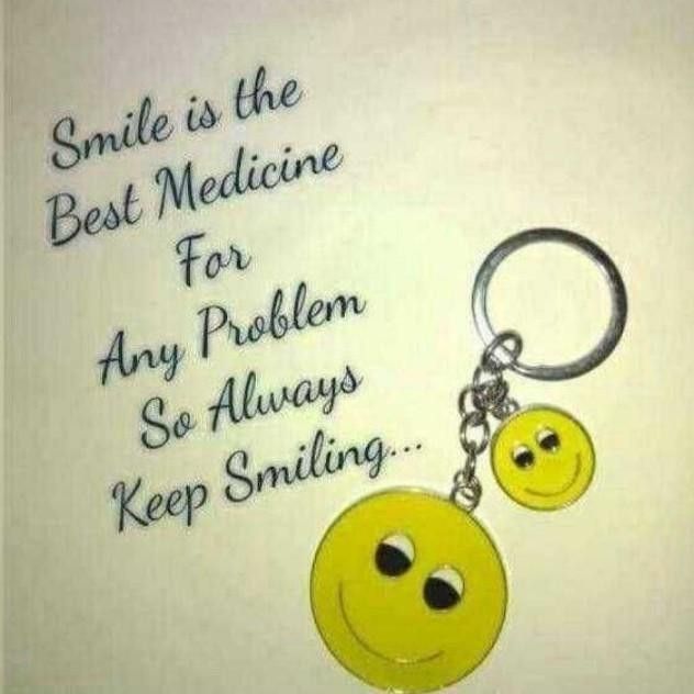 a smiley face keychain with the words smile is the best medicine for any problem so always keep smiling