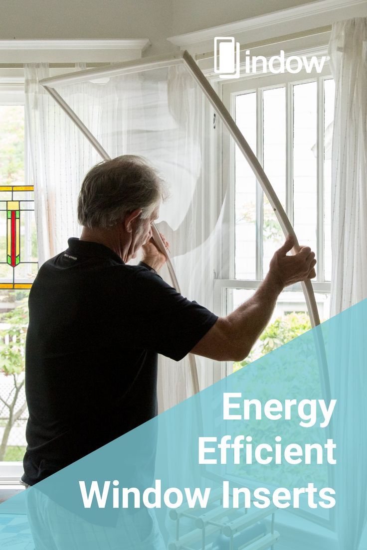 an older man is using the energy efficient window inserts