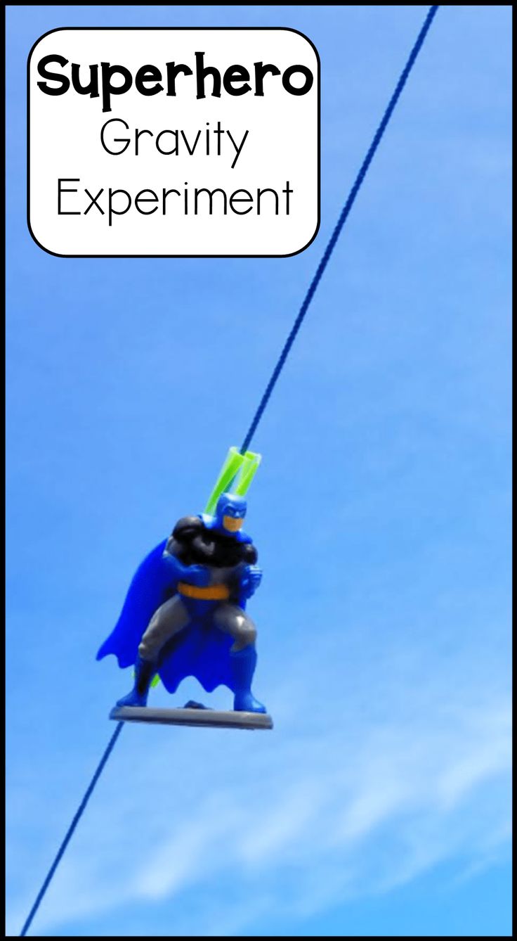 two toy figurines are hanging on a wire with the caption, superhero gravity experiment