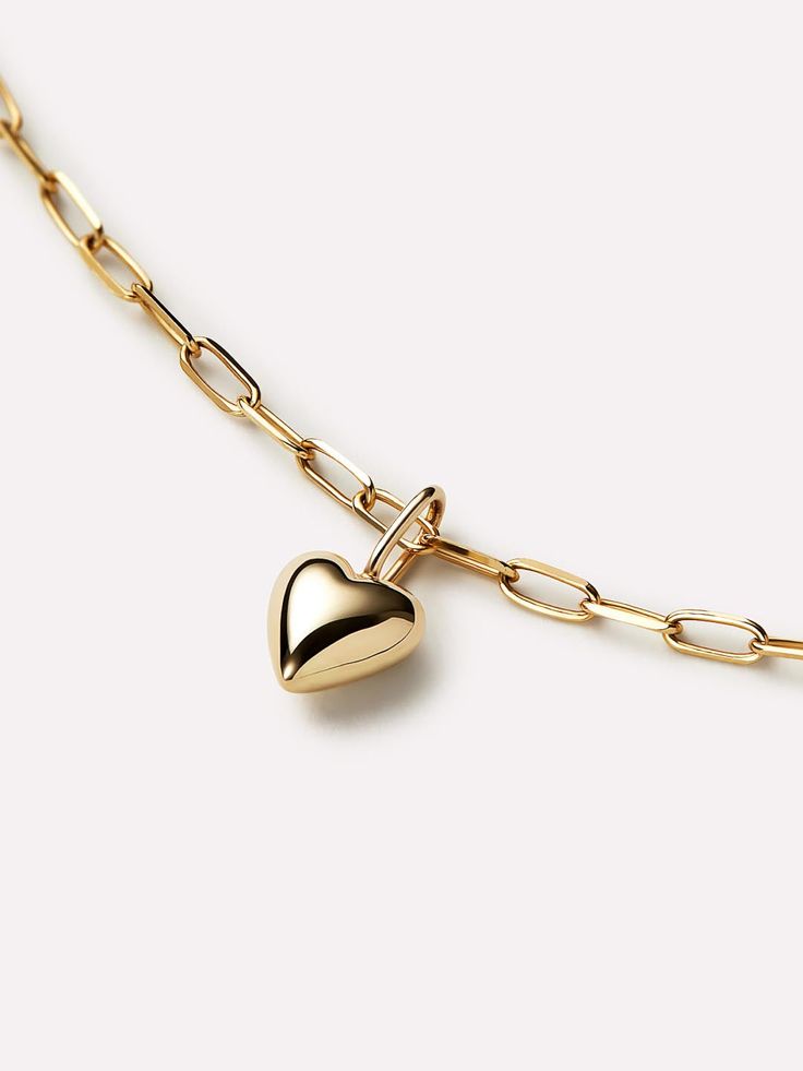 Add a charm to your everyday stack with this chic gold charm bracelet. Crafted in solid gold, this waterproof and tarnish-free pair features a delicate paperclip bracelet and shiny heart-shaped charm. For a bit of a bolder look, pair this bracelet with our Gold Bold Hoops. The Gold Heart Bracelet includes two pieces: Gold Chain Bracelet - Gold Paperclip Bracelet and Gold Pendant - Gold Heart Charm. • Made to last a lifetime • Crafted in waterproof solid gold • One bracelet & one charm Paperclip Bracelet, Gold Heart Bracelet, Solid Gold Charms, Pendant Heart, Solid Gold Chains, Gold Charm Bracelet, Gold Bracelet Chain, Bracelet Crafts, Letter Necklace