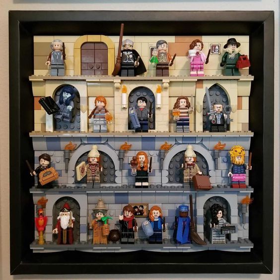 a display case with lego minifigures on it's sides and shelves