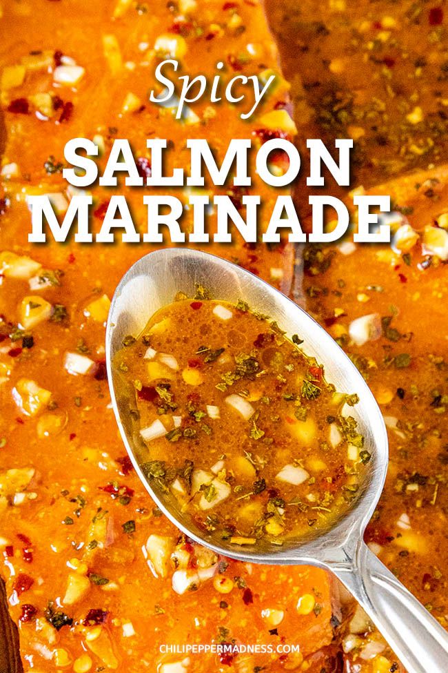 a spoon full of spicy salmon marinade on top of a white plate with the title above it