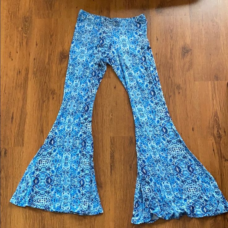 Never Worn (Aside From For The Photos), Blue Floral Flowy Pants From Altar’d State. Good Amount Of Stretch To Them. Bundle For A Discount. Bohemian Blue Bottoms For Spring, Blue Stretch Wide Leg Bottoms, Blue Wide Leg Stretch Bottoms, Blue Stretch Bottoms For Spring, Stretch Blue Bottoms For Spring, Spring Stretch Fit Blue Bottoms, Blue Stretch Pants For Summer, Blue Full-length Bottoms For Spring, Light Blue Bohemian Bottoms For Spring