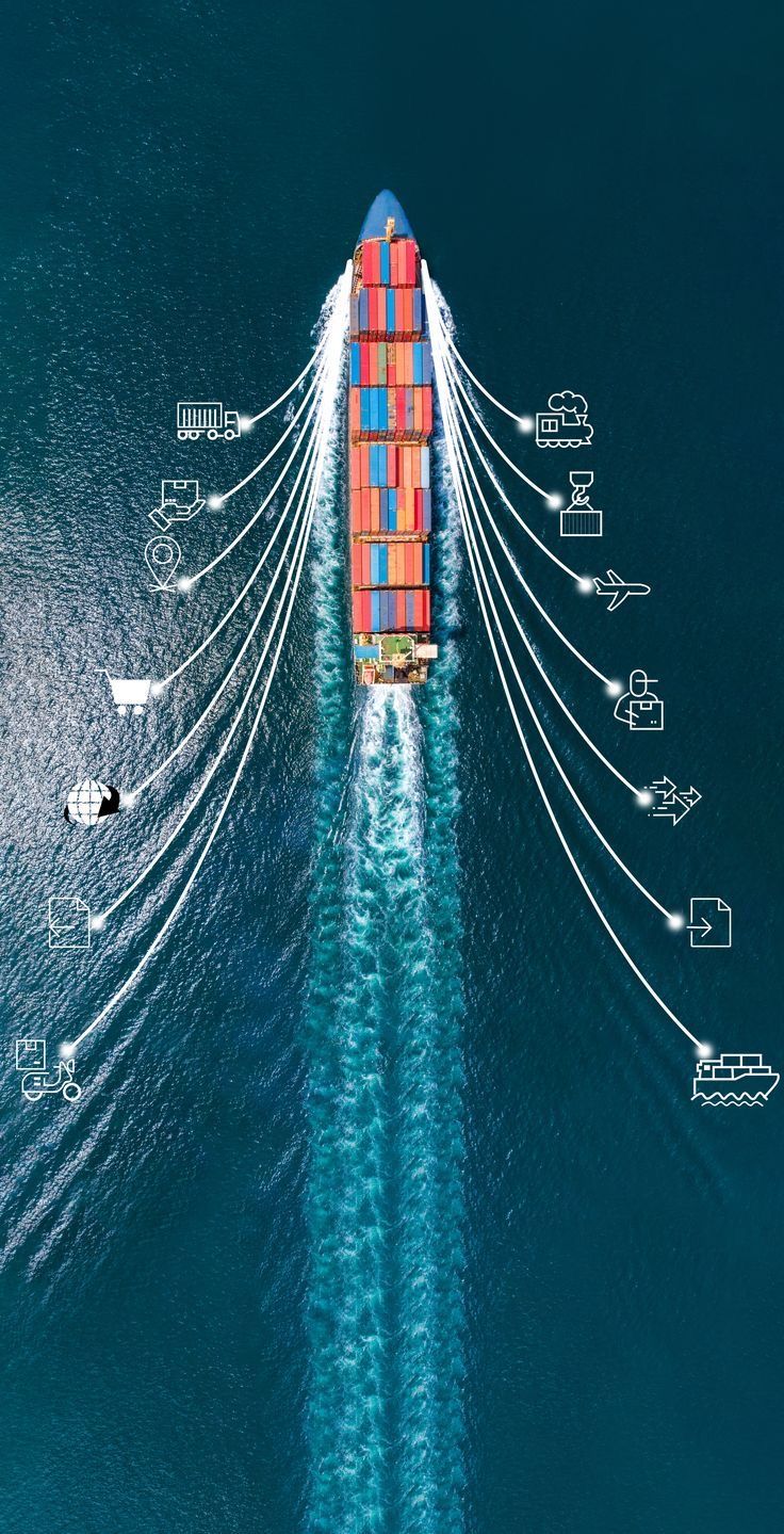 an aerial view of a large container ship in the middle of the ocean with many connections to other vessels