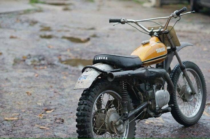 a dirt bike parked on the side of a road