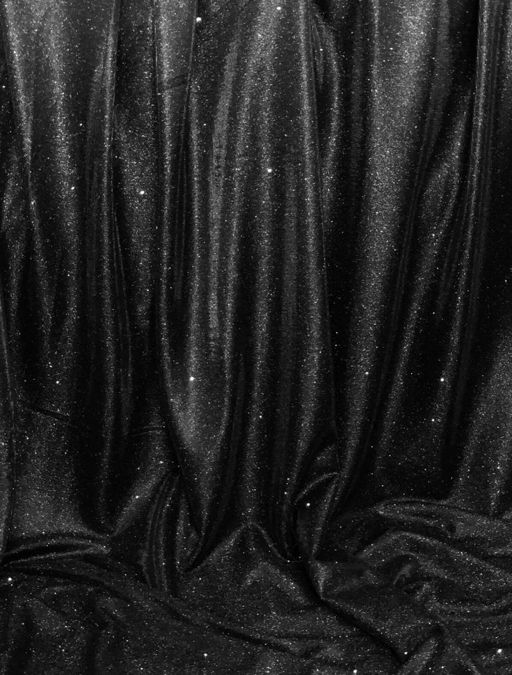 black and white photograph of shiny fabric