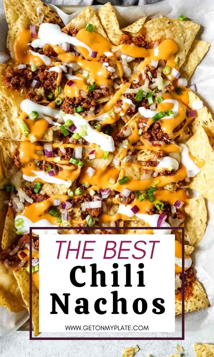 the best chili nachos with cheese on top and tortilla chips in front