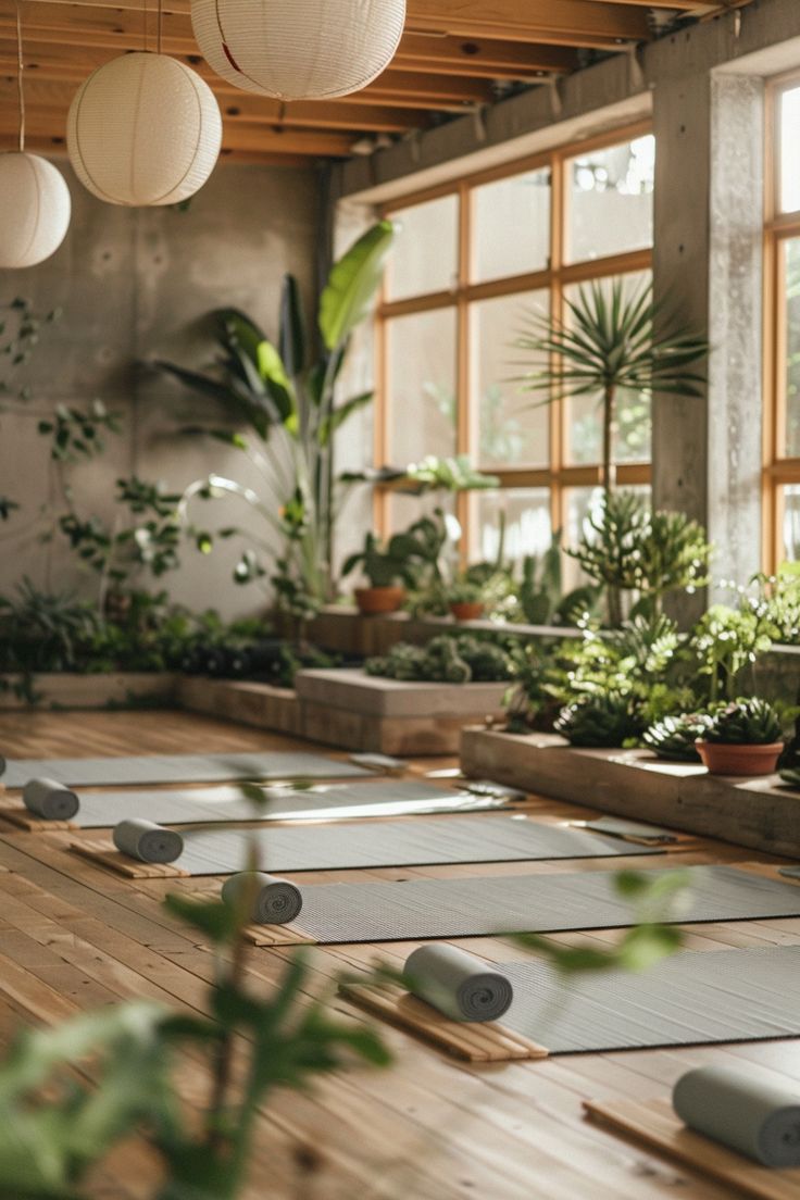 Creating Your Perfect Home Yoga Studio: A Step-by-Step Guide - TastyInteriors Yoga Studio Entrance Design, Outside Yoga Aesthetic, Cool Yoga Studio, Greenhouse Yoga Studio, Moody Yoga Studio, Tiny Yoga Studio, Spin Studio Aesthetic, Yoga Studio Plants, Cozy Yoga Studio