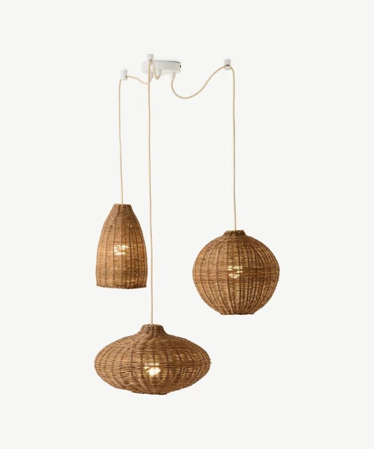 two hanging lights made out of wickers on a white background, one is brown and the other is beige