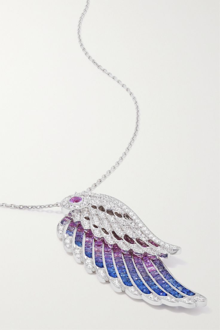 Inspired by colorful plumage, Garrard's 'Birds of Paradise' necklace is strung with two wing-shaped pendants, both decorated in beautiful diamonds and multicolored sapphires. It's made from 18-karat white gold and has an adjustable, jewel encrusted slider to create the perfect drop. Luxury White Gold Dangle Necklaces, Silver Sapphire Diamond Necklace In Fine Jewelry Style, Platinum Silver Necklace With Gemstone, White Gold Sapphire Jewelry With Pave Setting, Sapphire Pendant Diamond Necklace, Silver Sapphire Necklace With Single Cut Diamonds, Silver Sapphire Jewelry With Pave Setting, Sapphire Platinum Jewelry With Pave Setting, Dazzling White Gold Sapphire Necklace