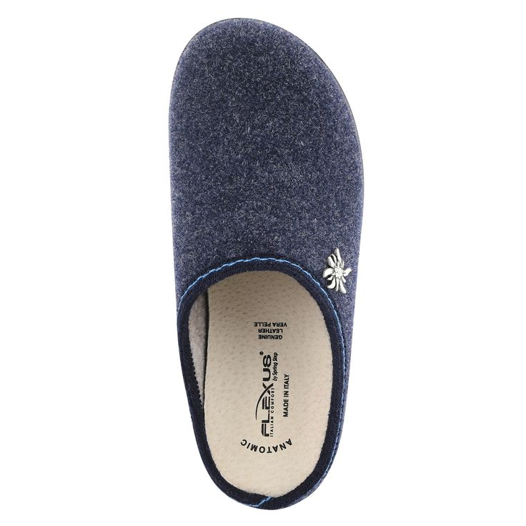 Flexus Style: LORALEE Indoor/outdoor slipper showcasing a beautiful side embellishment on a comfort outsole. Upper: Wool Lining: Textile Insole: Leather Outsole: Polyurethane Heel Height: 1 1/4" Platform Height: 5/8" Features: - Comfort, Flexible Sole, Padded Insole, Removable Insole, Anatomic Insole Made in Italy Indoor Outdoor Slippers, Spring Step Shoes, Outdoor Slippers, Casual Slippers, Spring Shoes, Outdoor Wear, Women's Casual, Slide Slipper, Stylish Women