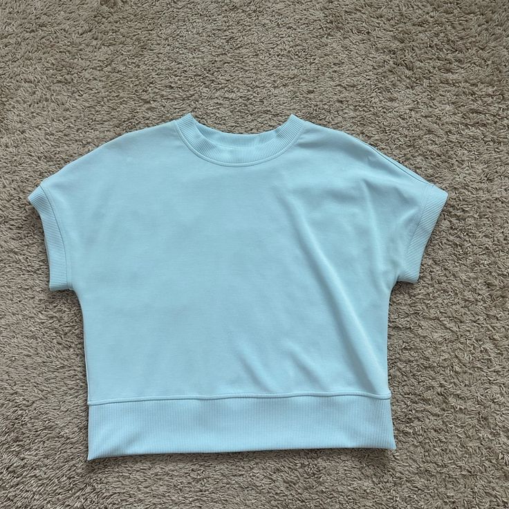 Brand New Condition. Super Soft And Comfy Athleisure Light Blue Crew Neck Top, Light Blue Short Sleeve Tops For Workout, Light Blue Athleisure Top For Loungewear, Sporty Light Blue Tops For Loungewear, Blue Short Sleeve Activewear For Loungewear, Lulu Tops, Lu Lu Lemon, Wild Indigo, Lululemon Align Tank