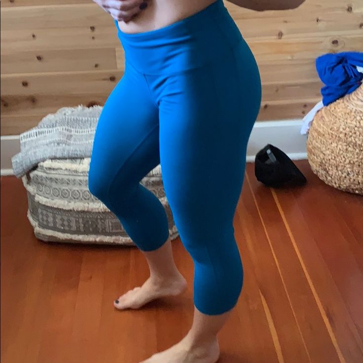 Teal Gapfit Crop Pants Stretch Blue Pants With Built-in Shorts, Casual Stretch Leggings By Gap, Casual Blue Tight Bottoms, Blue Tight Casual Bottoms, Blue Stretch Yoga Pants With Pockets, High Stretch Blue Pants With Pockets, Blue High Stretch Pants With Pockets, Gap Athleisure Yoga Bottoms, Gap Athleisure Pants With Pockets