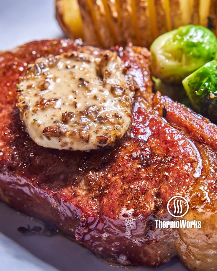 steak, potatoes and brussel sprouts on a plate