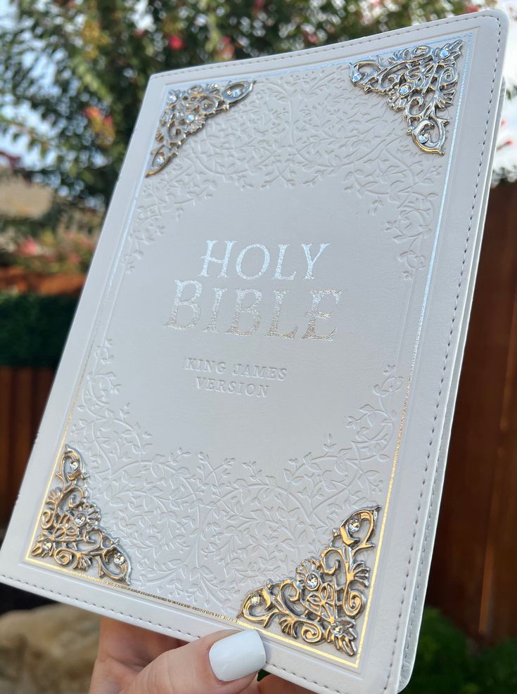 Celebrate the sacraments, rites and ceremonies of the Church with the White Faux Leather Large Print Thinline KJV Bible with Thumb Index! Whether you are celebrating a baptism, confirmation, church membership, first communion, christening, or wedding, the pure white KJV Bible will mark your rite of passage in a meaningful and memorable way.  this style is also available with floral tabs, please message me for pricing and ordering   (I started making these bibles to help pay for my husband's trem Kjv Journaling Bible, Bibles For Women, Pretty Bible, White Bible, Wedding Bible, Bible King James Version, Cute Bibles, Custom Bible, Catholic Bible