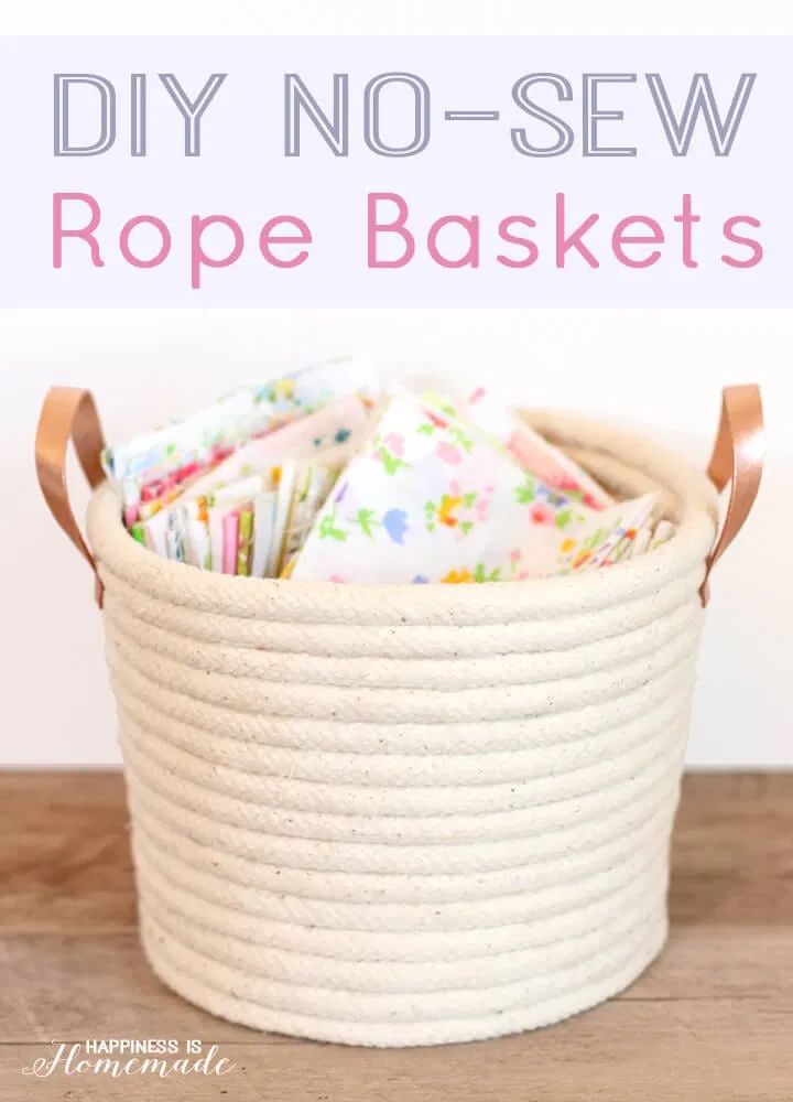 a white rope basket filled with fabric and paper napkins on top of a wooden table